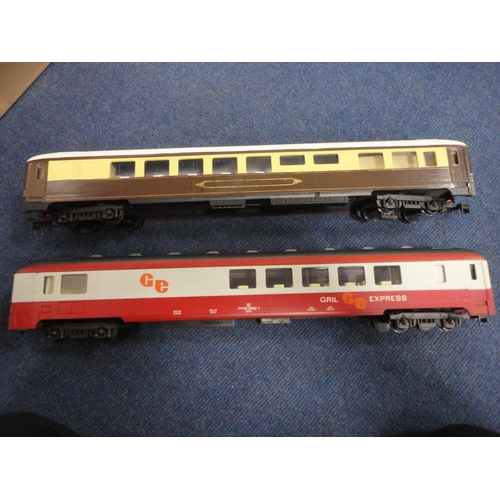 3 - Large Lima of Italy Gril Express coach, another, also model railway accessories and a book.