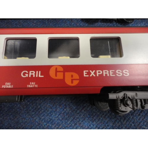 3 - Large Lima of Italy Gril Express coach, another, also model railway accessories and a book.