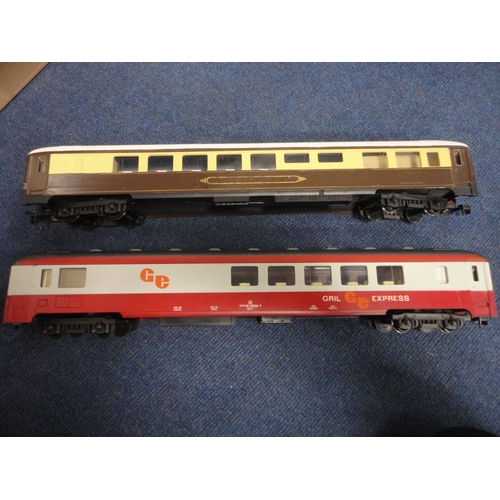 3 - Large Lima of Italy Gril Express coach, another, also model railway accessories and a book.