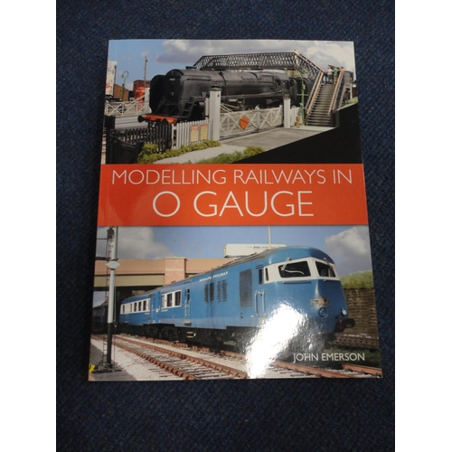 3 - Large Lima of Italy Gril Express coach, another, also model railway accessories and a book.
