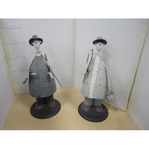 35 - Collection of contemporary figures and ornaments to include art pottery and humorous examples, and a... 