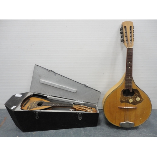 40 - Mandolin, cased, and another mandolin.  (2)
