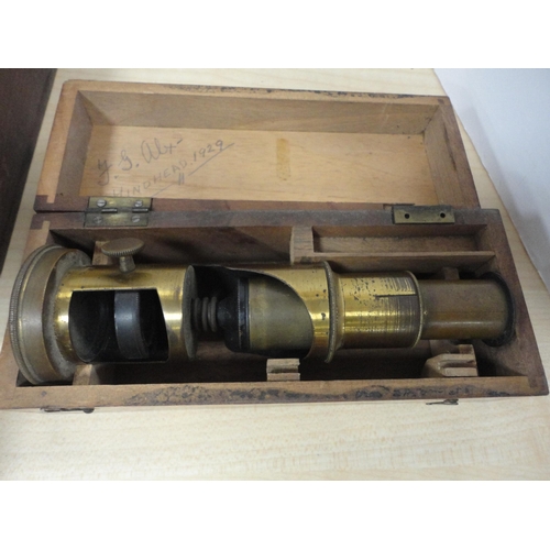 44 - Box containing glass lantern slides, boxed Precisa Balance weights, boxed microscope and a reproduct... 