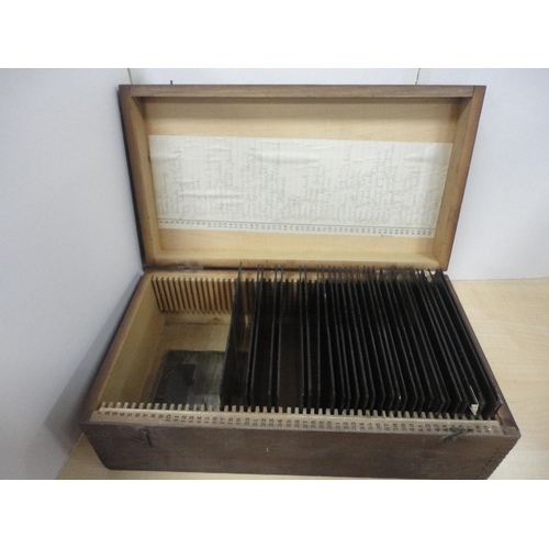 44 - Box containing glass lantern slides, boxed Precisa Balance weights, boxed microscope and a reproduct... 