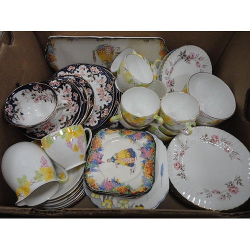 48 - Two boxes containing miscellaneous tea and dinnerwares to include Royal Standard, H & K Tunstall... 