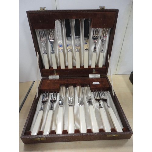 50 - Three cased sets of cutlery to include fish knives and forks, teaspoons, and a bag containing flatwa... 