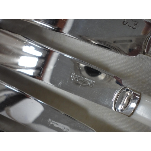 50 - Three cased sets of cutlery to include fish knives and forks, teaspoons, and a bag containing flatwa... 