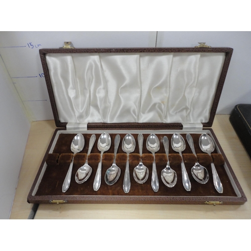 50 - Three cased sets of cutlery to include fish knives and forks, teaspoons, and a bag containing flatwa... 