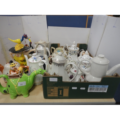 54 - Collection of teapots to include novelty teapots.