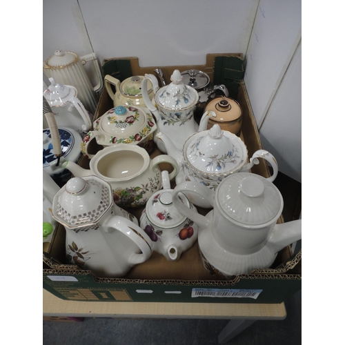 54 - Collection of teapots to include novelty teapots.