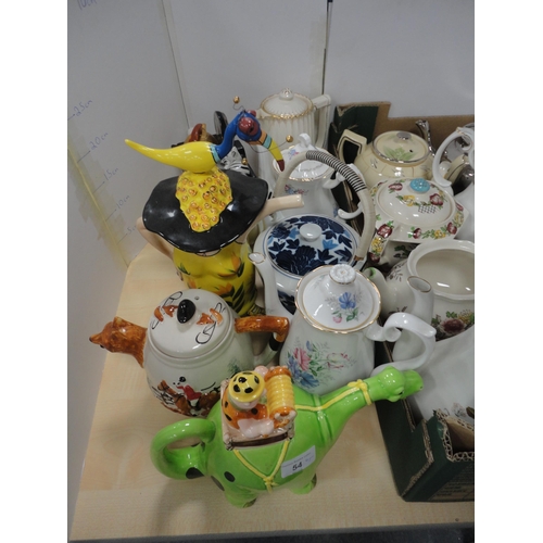 54 - Collection of teapots to include novelty teapots.