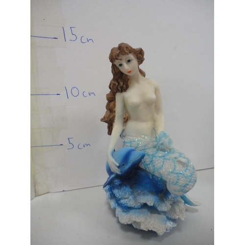 59 - Collection of contemporary figures to include dolphins, related dishes etc.