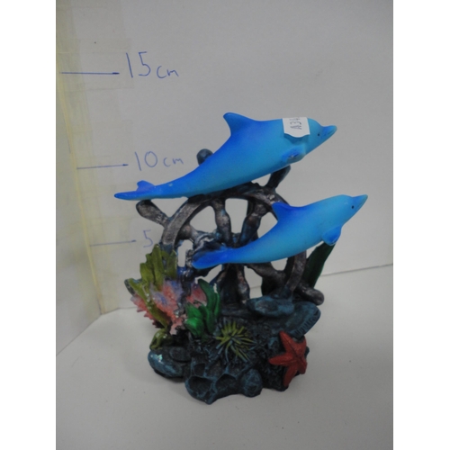 59 - Collection of contemporary figures to include dolphins, related dishes etc.