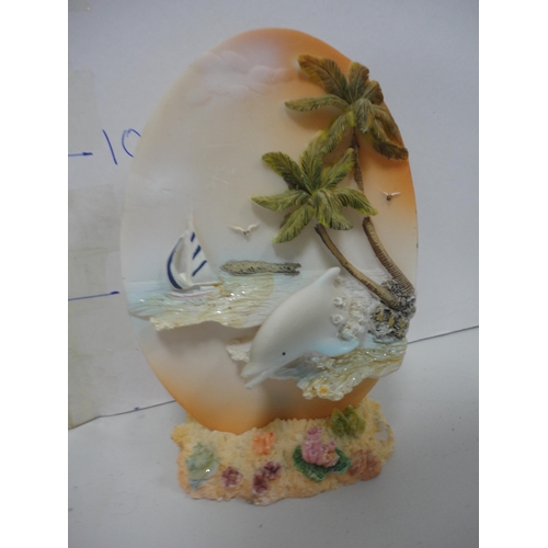59 - Collection of contemporary figures to include dolphins, related dishes etc.