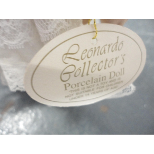 75 - Carton including Leonardo Collection porcelain-head dolls.