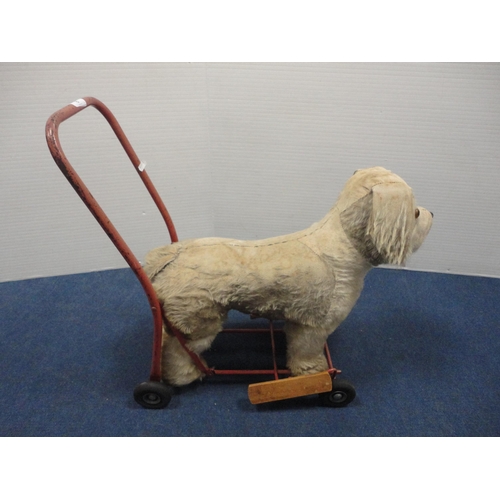 8 - Push-along dog toy.