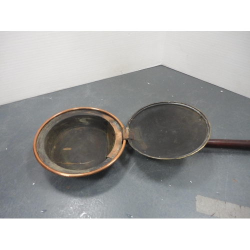 81 - Copper and brass bed warming pan, parasol, and a back scratcher.&nbsp; (3)