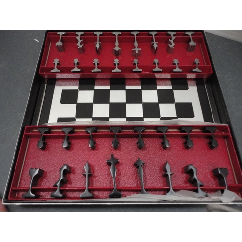 82 - Two boxed chess sets.