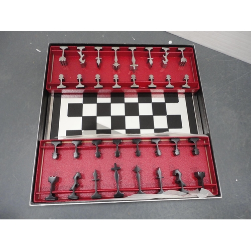 82 - Two boxed chess sets.