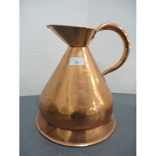 94 - Copper five litre jug, copper watering can and a brass jam pan with iron handle.  (3)