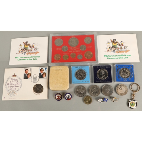 154 - Assorted commemorative coins including Commonwealth games, Royal family, pins and badges, etc