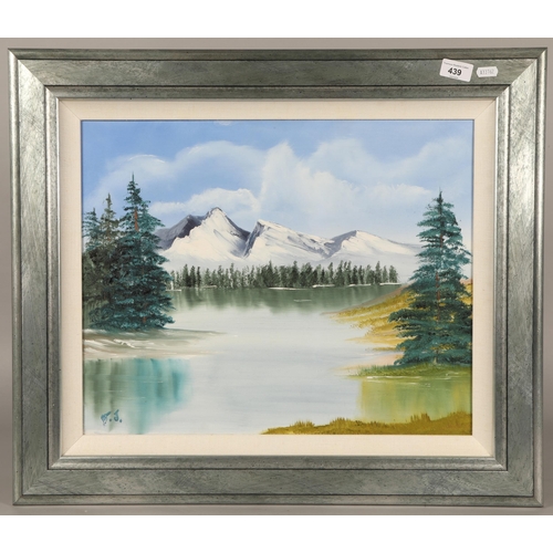 439 - A contemporary wall mirror with three framed pictures of mountain landscapes etc