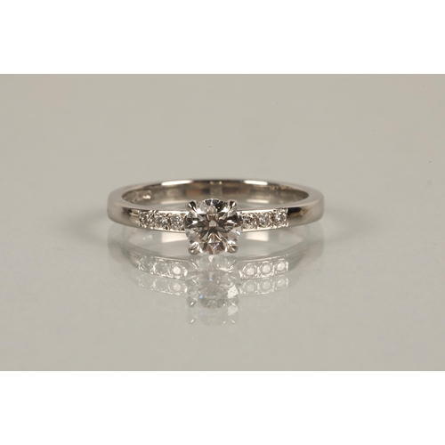 50 - Platinum brilliant cut 0.50ct diamond solitaire ring with diamond shoulders, ring size N/O