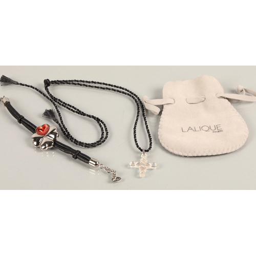 53 - Lalique jewellery four leaf clover heart bracelet with leather strap, and a cross charm necklace