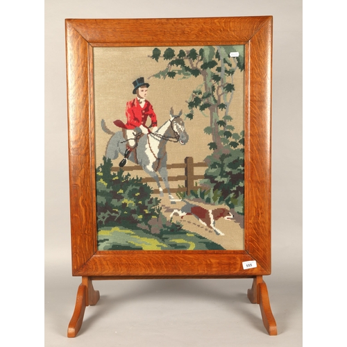 555 - Needlework tapestry firescreen depicting hunting scene, 85cm high