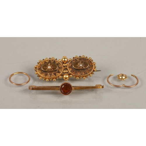 68 - Yellow metal bar brooch with illegible markings set with an orange gem, a yellow metal brooch set wi... 