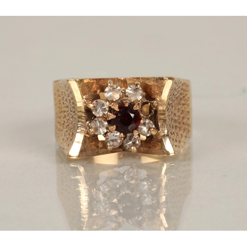 95 - 9ct gold ring set with white gems (one missing) surrounding a pink gem, ring size O, 5.9g