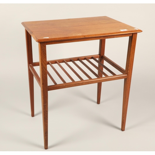 463 - Two-tier teak occasional table, 67cm high