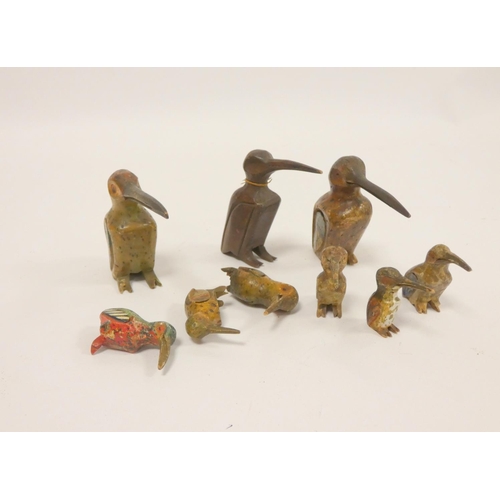 322 - Collection of Black Forest carved wooden woodpecker figures with applied painted features.