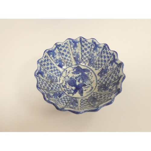 232 - Oriental porcelain to include a Japanese scalloped rim bowl decorated with children amongst foliage,... 