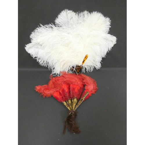 308 - Red Ostrich feather folding fan with simulated tortoiseshell sticks, and another of white feathers (... 