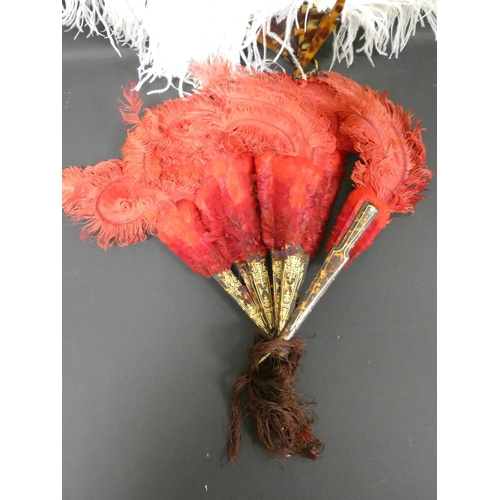 308 - Red Ostrich feather folding fan with simulated tortoiseshell sticks, and another of white feathers (... 