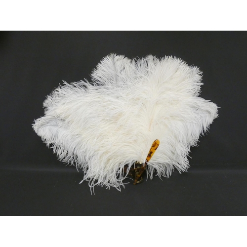 308 - Red Ostrich feather folding fan with simulated tortoiseshell sticks, and another of white feathers (... 