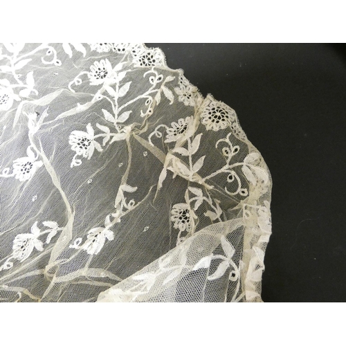 311 - Edwardian black net over jacket, a similar white lace floral decorated shawl, a black cape, various ... 