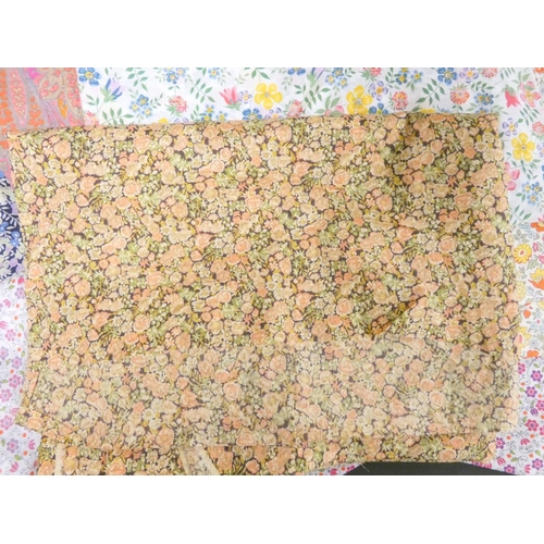 313 - A collection of Liberty of London vintage cotton lawn fabric lengths to include Delfie Organic patte... 