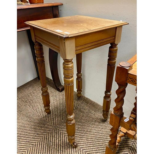 501 - Occasional table/jardiniere stand raised on turned supports and casters, 74cm high