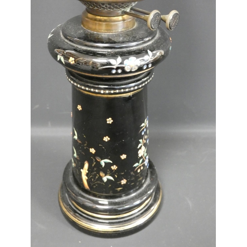 328 - Victorian duplex paraffin table light with opaque milk glass globe, the black glass base decorated w... 