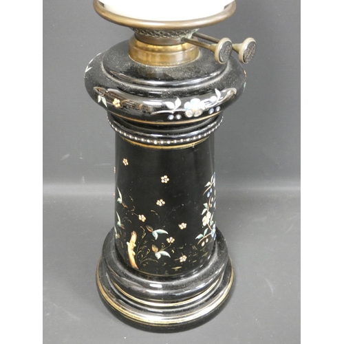 328 - Victorian duplex paraffin table light with opaque milk glass globe, the black glass base decorated w... 