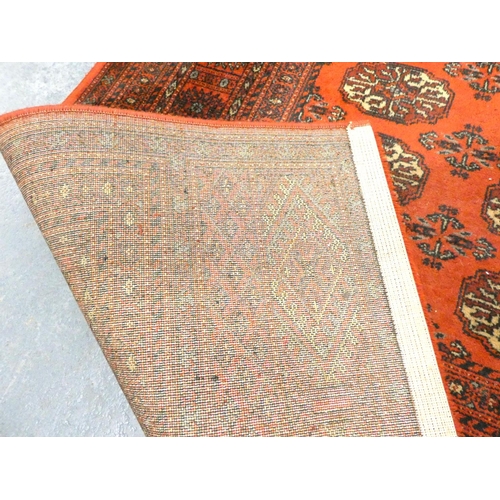 334 - Machine made Bokhara carpet, 333cm x 200cm