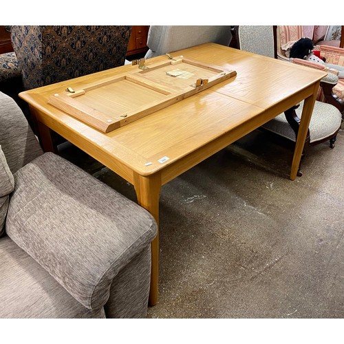 606 - Contemporary extending oak dining table