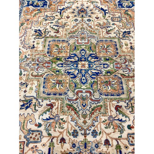 587 - Eastern-style floor rug, 3.53m x 2.73m