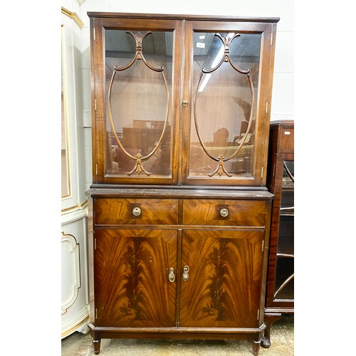 641 - Mahogany bookcase over cupboard