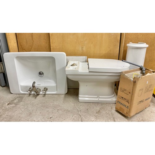 663 - White porcelain bathroom set including sink and toilet