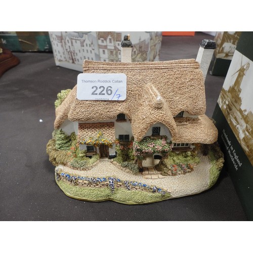 226 - Seven Lilliput Lane model buildings and cottages, five with boxes.  (7)