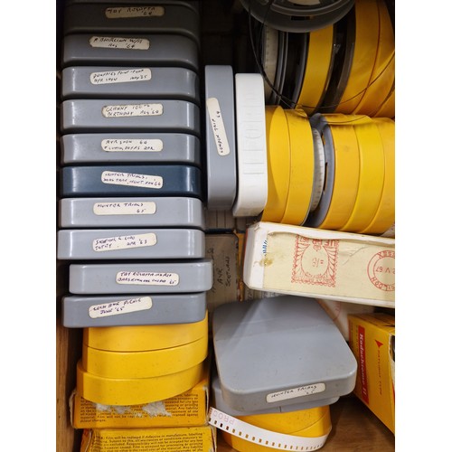 670 - A stack of three wooden filing drawers containing large quantity of film reels, photographic slides,... 