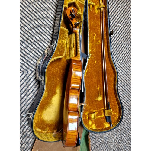 345 - Cased violin with a silver tipped W. E. Hill & Sons bow, violin approx 23